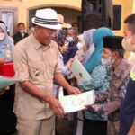 Serahkan Sertifikat PTSL & Buka Turnamen Bulu Tangkis, Kang Jimat Apresiasi Desa Cikujang1
