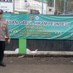 Polsek Singajaya Bersama Warga Pasang Spanduk Himbauan Anti Knalpot Bising, Miras & Narkoba